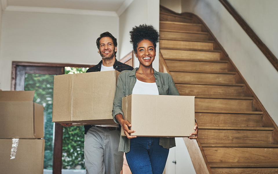 People moving boxes in.