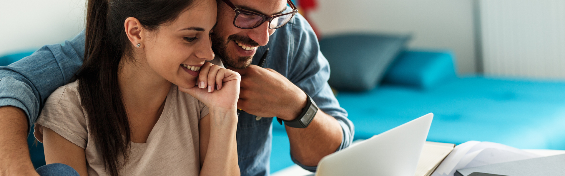 Couple looking at a computer