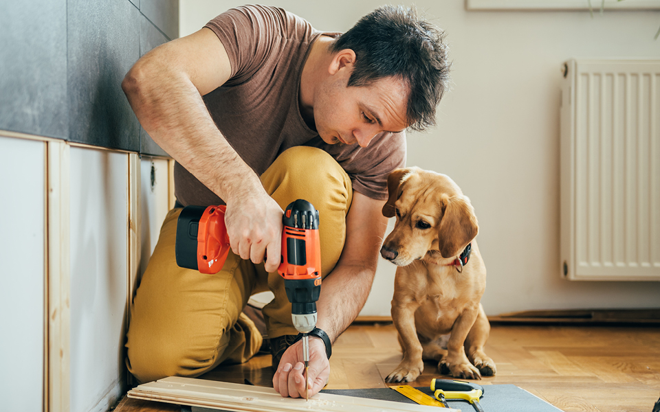 Man drilling a board